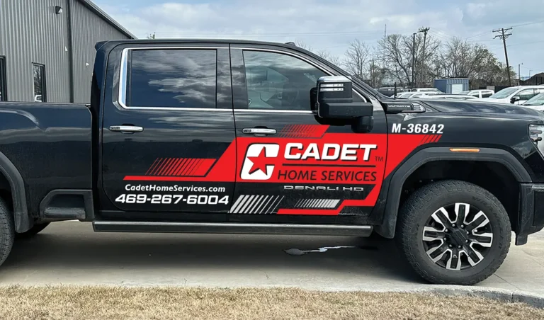 Cadet Home Services black Denali truck with a striking red and white wrap, designed for high contrast and standout branding.